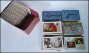 A collection of Vintage greetings type postcards approx 650. Highly decorative mostly with