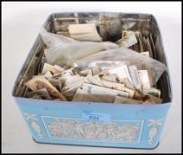 A collection of assorted vintage cigarette cards t