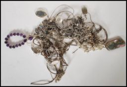 A large collection of silver and silver white metal jewellery to include a good selection of