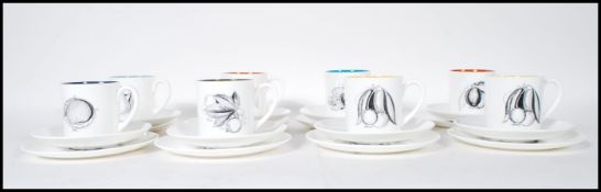 A retro Susie Cooper for Wedgwood coffee service in black fruit pattern to include eight coffee