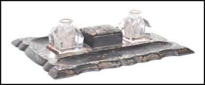 An early / mid 20th Century Chinese lacquered desk tidy and inkwell set with abalone shell, having