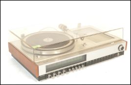 A mid 20th Century retro teak cased Philips record deck model 802 having tuner and built-in