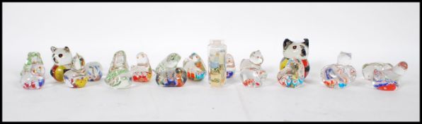 A collection of 20th Century glass animal paperweights in the form of a selection of animals