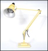 A vintage mid 20th Century retro Herbert Terry Anglepoise table / desk lamp in original yellow