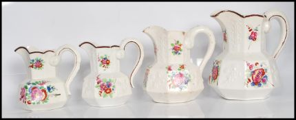 A group of four 19th Century Staffordshire ceramic jugs, possibly mason's in the Hydra shape of