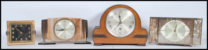 Two mid 20th Century vintage retro Metamec mantle clocks together with another of similar form and