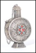 A late 19th / early 20th Century Chinese silver opium snuff / scent perfume bottle of moon flask