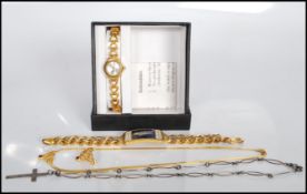 A commemorative concorde bracelet having a central panel enamelled with concorde being set with