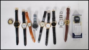 A collection of eleven / 11 gents Quartz movement wrist watches, most appear to be working to