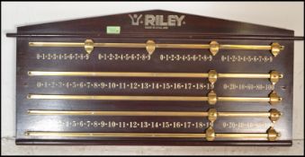 A 20th Century Riley mahogany framed snooker score board, of rectangular outline with pedimented