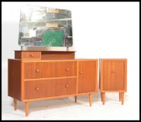 A retro 20th Century teak wood dressing table and