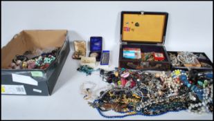 A collection of costume jewellery to include rings, earrings, brooches, bracelets, bangles,