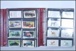 A collection of Grandee cigar collector cards set over two albums, card sets to include Top Dogs,