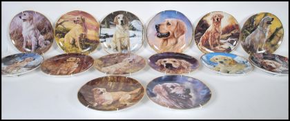 A collection of twelve Golden Retriever Danbury Mint collector plates, the complete set of twelve