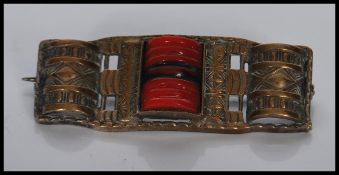 A early 20th Century Art Deco Egyptian Revival bro