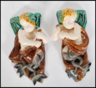 A pair of 19th Century Victorian figural majolica