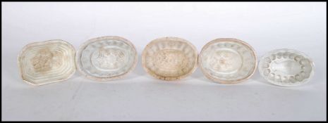 A group of five 19th Century ceramic miniature jel