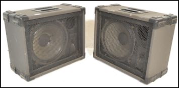 A pair of Scott Sound Systems speakers, model number P12, Watts 100 OHMS 8, black leatherette