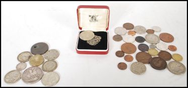 A collection of coins dating from the early 19th Century to include a George IV 1821 crown with