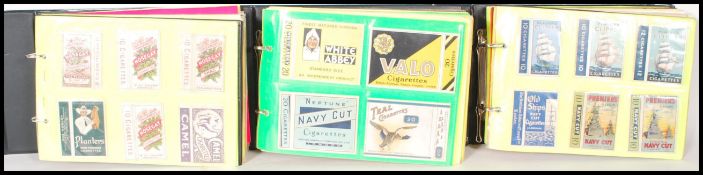 A collection of vintage 20th Century cigarette boxes over three albums, brands to include Players