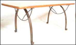 A large 20th Century plank top refectory dining table, the table top constructed from reclaimed pine