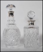 Two 20th Century cut glass crystal decanters to include a J A Campbell whiskey decanter of square