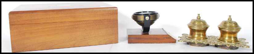 A good quality dealers lot to include a brass bankers lamp, a mahogany mounted compass on gimbal,