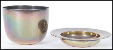 A silver hallmarked bowl and dish, the hallmarked dish with assay mark for London and dating to