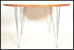 A retro 20th Century teak wood circular dining tab
