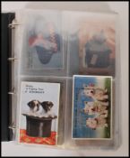 A collection of novelty pull out postcards, called Mailing Novelty, Novelty View with souvenir