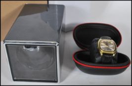 A Tissot seastar Automatic gents wrist watch, gilt case with baton markers and day and datejust