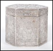 A 20th Century Chinese silver white metal lidded trinket pot of hexagonal form having raised