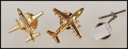 Two vintage 20th Century gold plated cufflinks in the form of military airplanes together with a