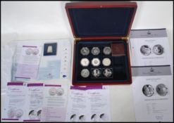 A collection of silver proof commemorative coins to include 1977 silver Jubilee x2, Britannia
