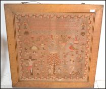 A 19th Century Victorian sampler worked by Phoebe Wright . Work Aged 11 1852. Religious Hymn with