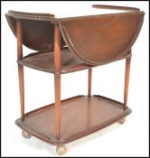 Ercol - A 1970's retro vintage beech and elm wood butlers / service / tea trolley having three