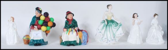 A collection of Royal Doulton ceramic figurines to include Harmony HN 4096, Joy HN 3875, Welcome