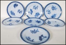 A matching set of seven early 20th Century blue and white dinner plates having blue pattern