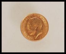 A 22ct gold 1913 half sovereign coin having a George V head facing left with George and the Dragon