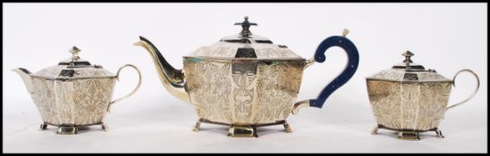 A good quality early 20th Century Walker & Hall silver plate tea service of octagonal form