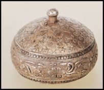 A mid 20th Century silver 925 lidded trinket pot. The body having embossed floral and pattern