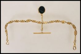 A 9ct yellow gold pocket fob watch chain having hollow links with pierced and engraved floral