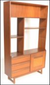 A retro mid 20th Century teak wood room unit having fitted shelves with one being adjustable above a