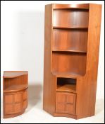 A retro 20th Century teak wood lounge three piece modular display cabinet by Nathan, comprising of