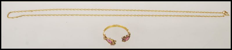 A 9ct yellow gold fine link necklace chain having a spring ring clasp. Chain measures 16 inches