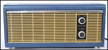 A vintage mid 20th Century Fidelity Solid State record player having a blue case with a grey lid,