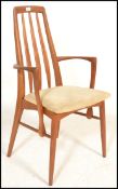 A retro 20th Century Kofod Larsen teak wood open framed elbow Chair together with a set of three dot