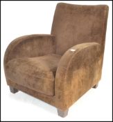 Lignet Roset - A late 20th century art deco shaped easy / lounge chair / armchair having an art deco