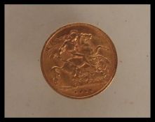 A 22ct gold 1911 half sovereign coin having George V facing left with the George and the Dragon to