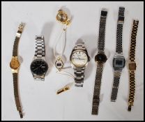 A collection of vintage 20th century ladies and gents watches to include a black face Seiko, white